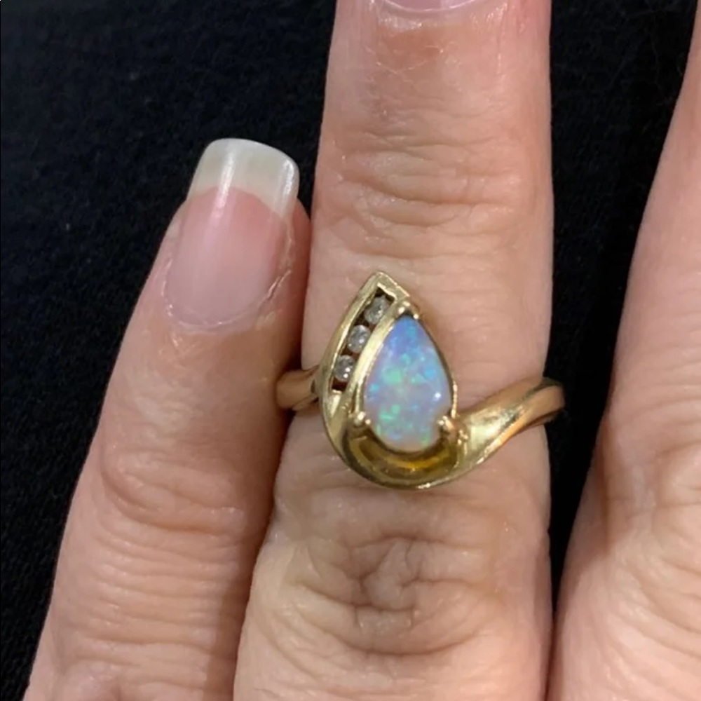 Opal and diamond ring